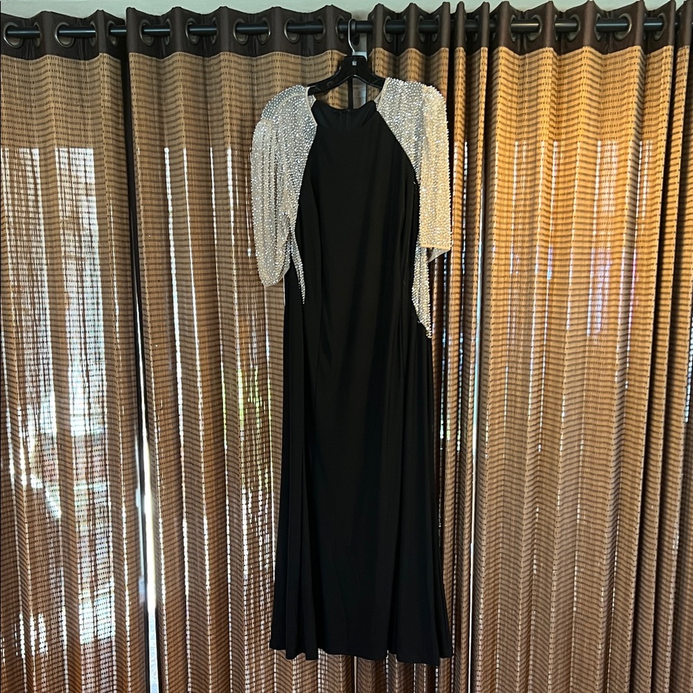 Elegant Black Dress with Silver Accents by Xscape.